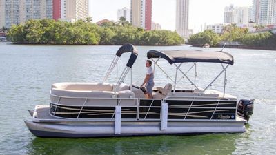 Photo of 24’ Bentley pontoon boat in Sunny Isles Beach, FL.